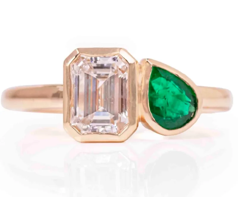 Lady's Fashion Ring With One 1.16Ct Emerald G/H I1 Diamond And One 0.48Ct Pear Emerald