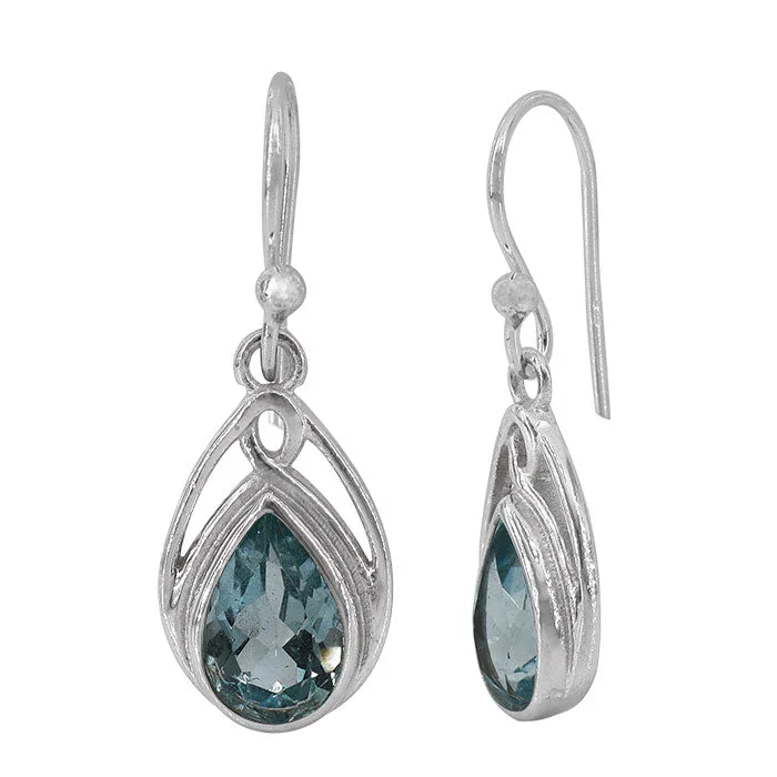 Sterling silver with rhodium, 7x10mm blue topaz earrings